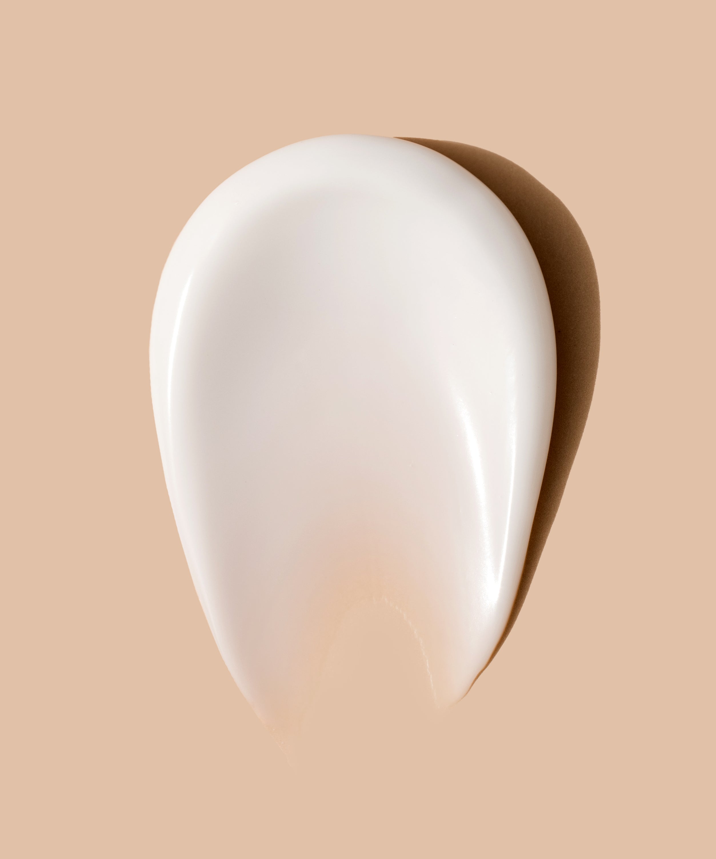 creamy-smear-of-white-cosmetic-texture-on-beige-ba-2024-11-25-21-51-41-utc.jpg